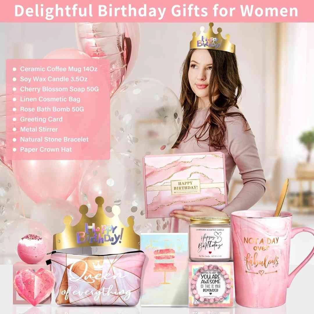 Delightful birthday gift set for women, featuring a pink ceramic mug, soy wax candle, rose bath bomb, makeup bag, and birthday crown.