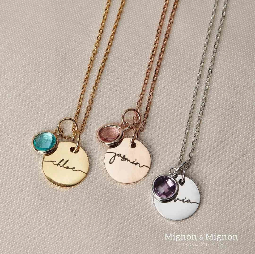 Gold, silver, and rose gold personalized name necklaces with birthstone charms.